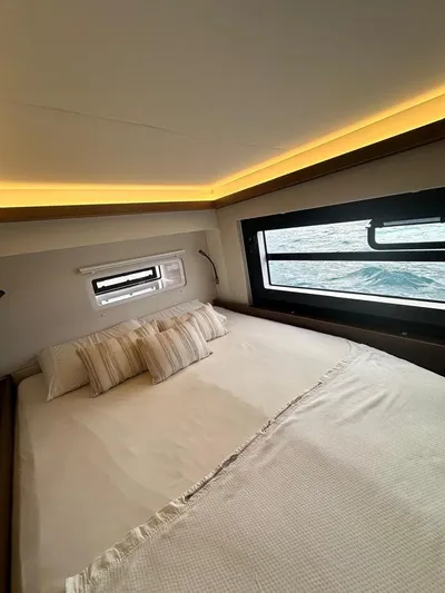 Hayat Yacht Photos Pics Luxurious bedroom in 2021 Nautitech 46 Fly catamaran with ocean view.
