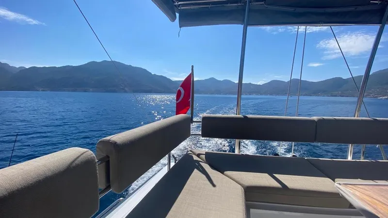 Hayat Yacht Photos Pics Nautitech 46 Fly 2021 yacht with scenic mountain and sea view.