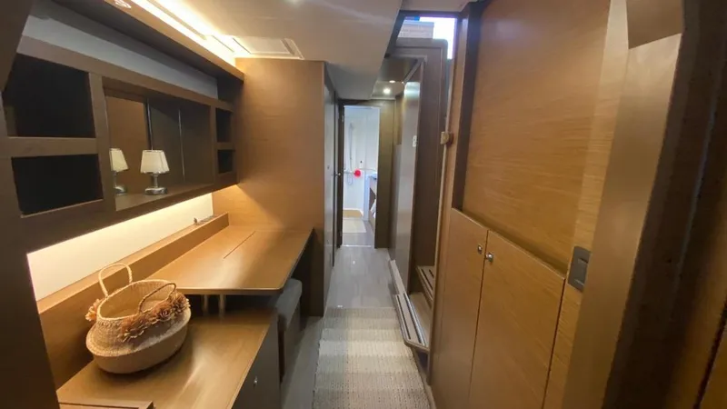 Hayat Yacht Photos Pics Interior hallway of 2021 Nautitech 46 Fly yacht with modern wooden design.