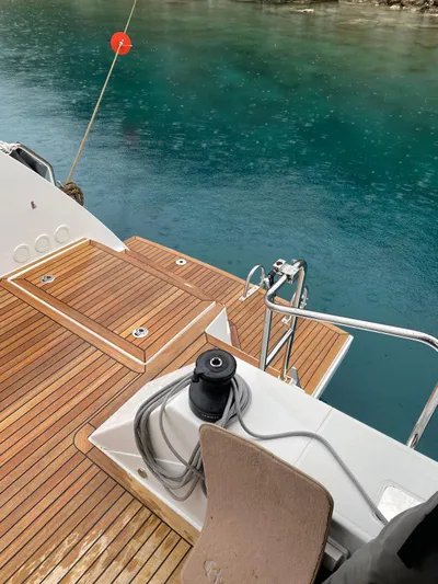Hayat Yacht Photos Pics Nautitech 46 Fly 2021 yacht deck with wooden flooring and ocean view.