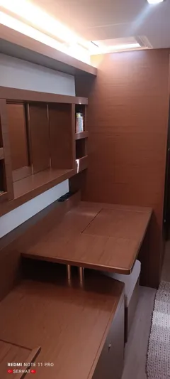 Hayat Yacht Photos Pics Interior of 2021 Nautitech 46 Fly yacht with wooden furnishings and modern design.