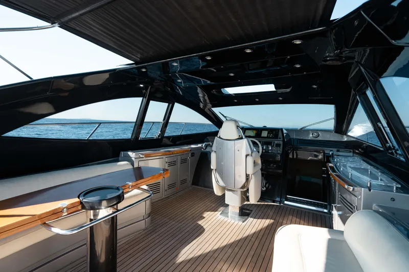  Yacht Photos Pics Luxurious interior of a 2009 Riva 63 Vertigo yacht with sleek design and ocean view.