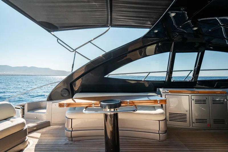  Yacht Photos Pics Luxurious 2009 Riva 63 Vertigo yacht interior with sleek design and ocean view.