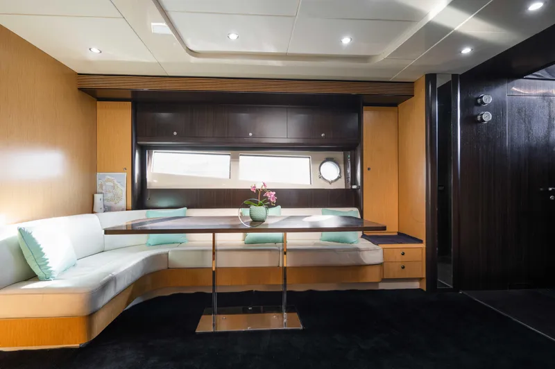  Yacht Photos Pics Luxurious interior of 2009 Riva 63 Vertigo yacht with elegant seating and modern design.