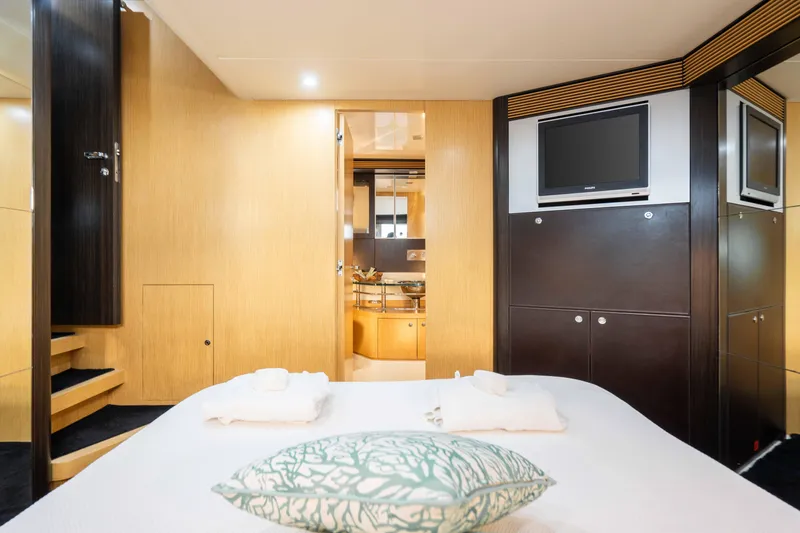  Yacht Photos Pics Luxurious cabin interior of 2009 Riva 63 Vertigo yacht with modern amenities.