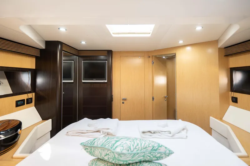  Yacht Photos Pics Luxurious cabin interior of 2009 Riva 63 Vertigo yacht with modern amenities.