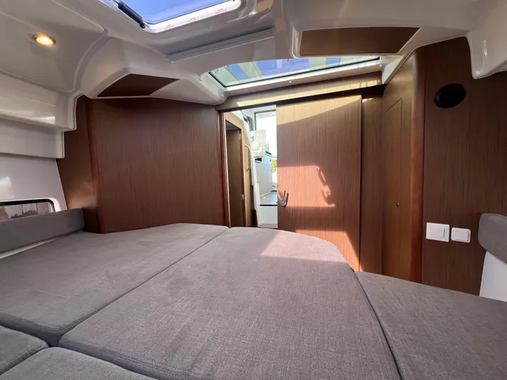  Yacht Photos Pics Interior cabin of 2020 Beneteau Antares 9 with modern design and skylight.