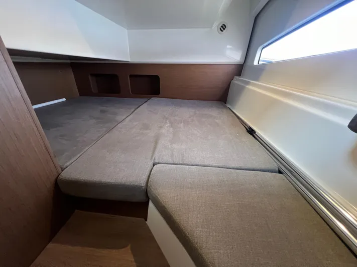  Yacht Photos Pics Interior cabin of 2020 Beneteau Antares 9 with comfortable seating and modern design.