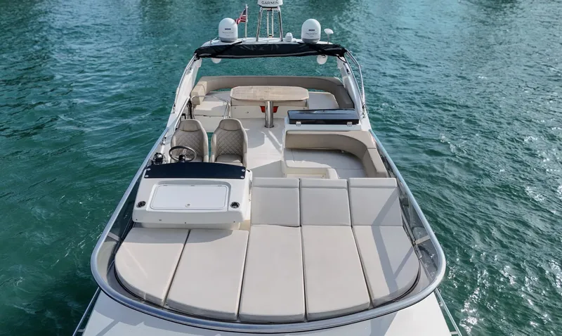  Yacht Photos Pics Luxury Absolute 50 Fly yacht, 2017 model, with spacious deck and seating on calm waters.