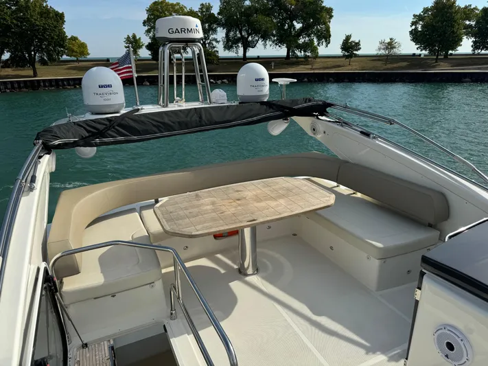  Yacht Photos Pics Luxury seating area on a 2017 Absolute 50 Fly yacht with Garmin equipment.