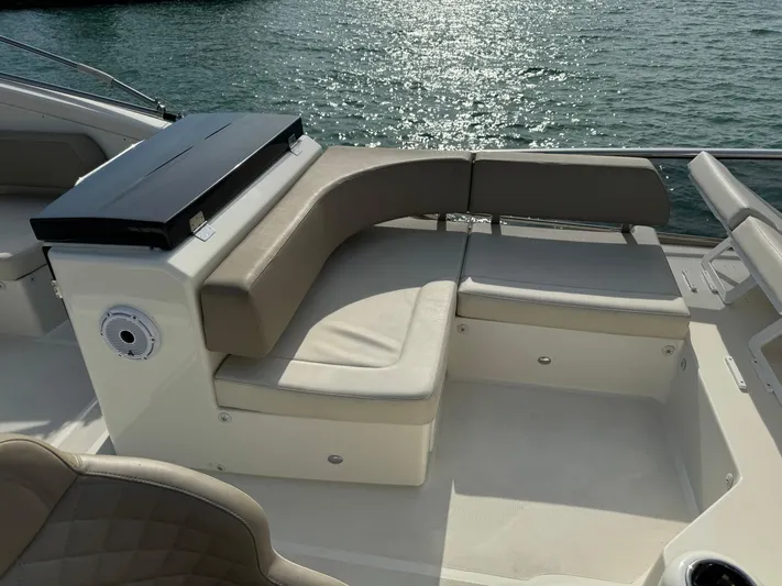  Yacht Photos Pics Luxurious seating area on a 2017 Absolute 50 Fly yacht, overlooking sparkling water.