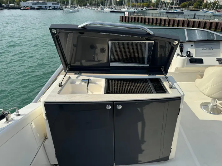  Yacht Photos Pics Outdoor kitchen on 2017 Absolute 50 Fly yacht with sink and grill.