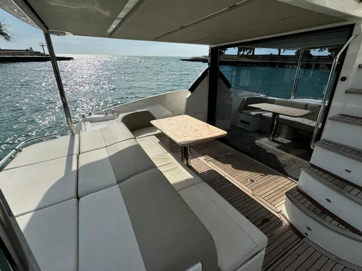  Yacht Photos Pics Luxurious 2017 Absolute 50 Fly yacht with spacious deck and elegant seating area.