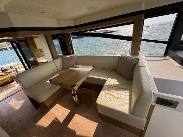  Yacht Photos Pics Luxurious interior of 2017 Absolute 50 Fly yacht with elegant seating and ocean view.