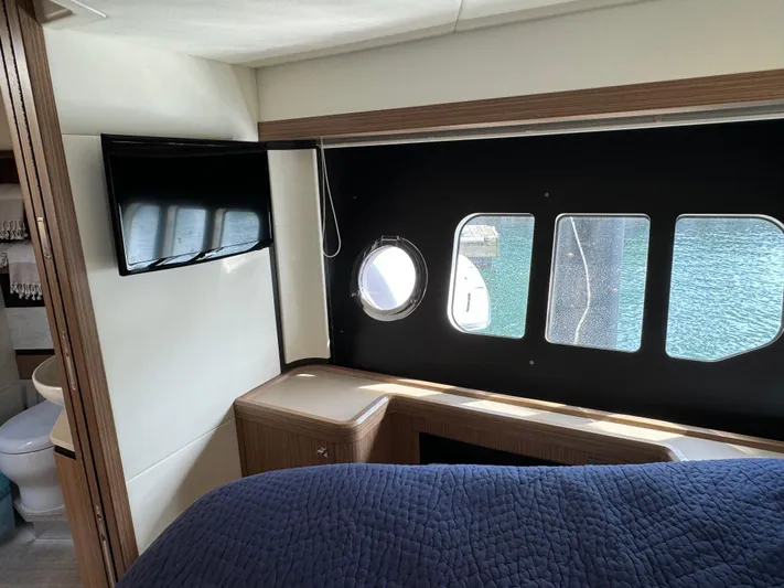  Yacht Photos Pics Interior of 2017 Absolute 50 Fly yacht with window view and modern amenities.