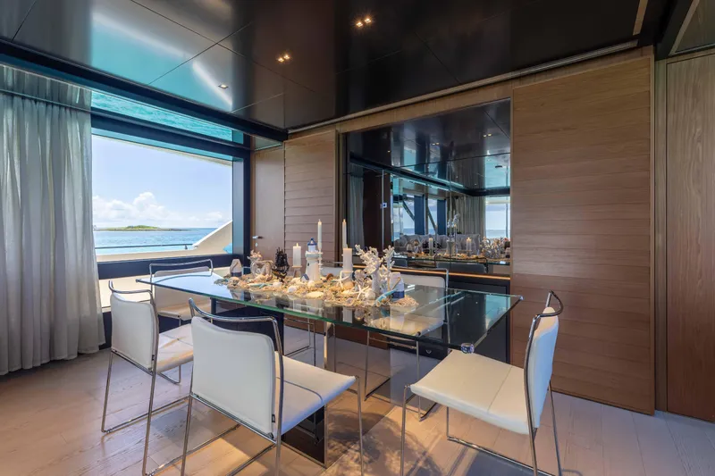 Kiyomizu Yacht Photos Pics Luxurious dining area on 2020 Riva 90 Argo yacht with ocean view.