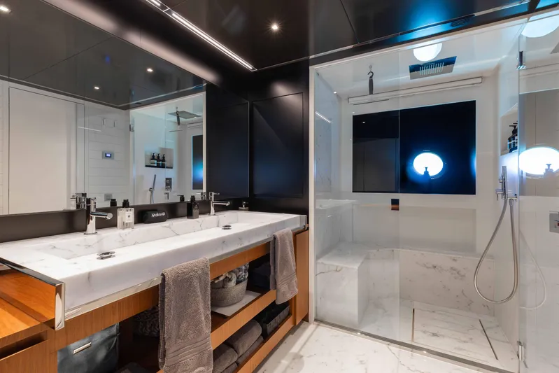 Kiyomizu Yacht Photos Pics Luxurious bathroom on 2020 Riva 90 Argo yacht with marble sink and modern shower.