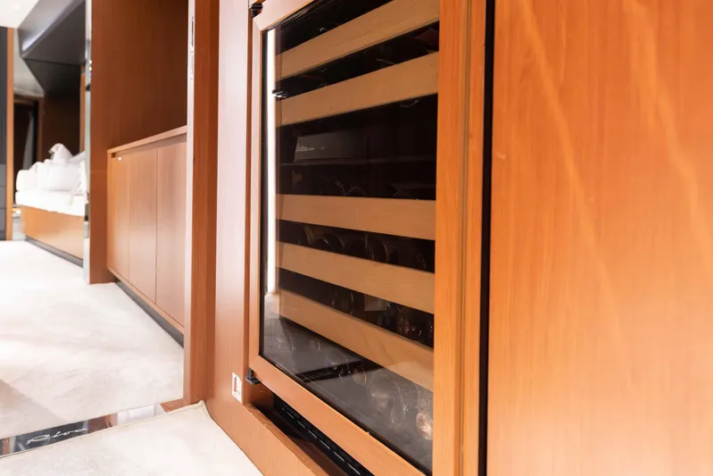 Kiyomizu Yacht Photos Pics Luxurious interior of 2020 Riva 90 Argo yacht with elegant wood paneling.