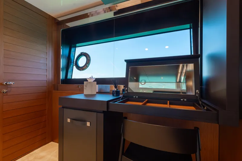 Kiyomizu Yacht Photos Pics Luxurious interior of 2020 Riva 90 Argo yacht with elegant wooden finishes.
