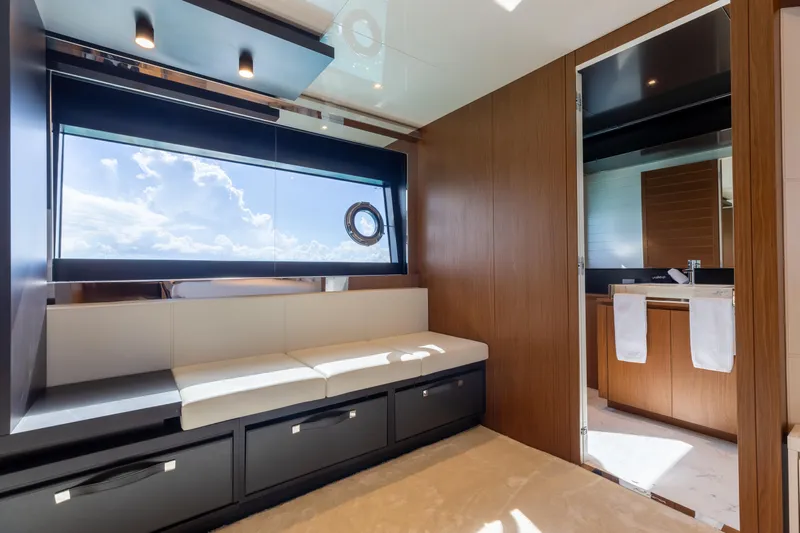 Kiyomizu Yacht Photos Pics Luxurious interior of 2020 Riva 90 Argo yacht with modern seating and bathroom.