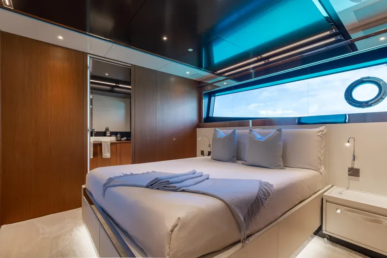 Kiyomizu Yacht Photos Pics Luxurious bedroom interior of 2020 Riva 90 Argo yacht with modern design and large window.