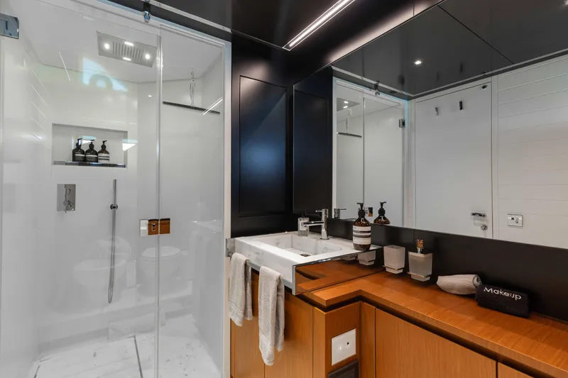 Kiyomizu Yacht Photos Pics Luxurious bathroom on 2020 Riva 90 Argo yacht with modern fixtures and elegant design.