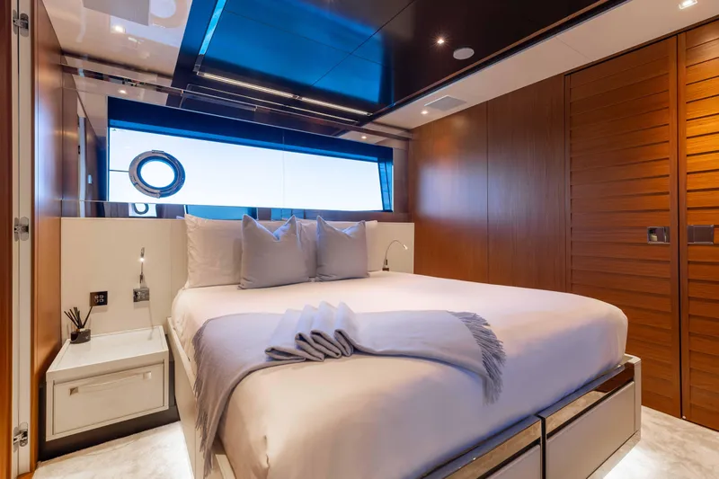Kiyomizu Yacht Photos Pics Luxurious bedroom interior on 2020 Riva 90 Argo yacht with modern design and elegant furnishings.