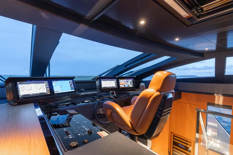 Kiyomizu Yacht Photos Pics Luxurious 2020 Riva 90 Argo yacht cockpit with modern navigation systems and leather seating.