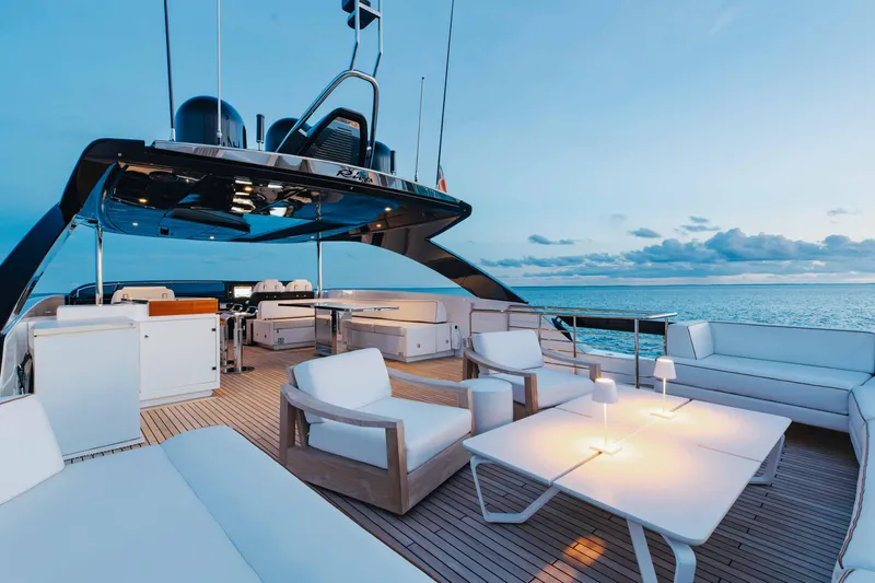 Kiyomizu Yacht Photos Pics Luxurious 2020 Riva 90 Argo yacht deck with elegant seating and ocean view.