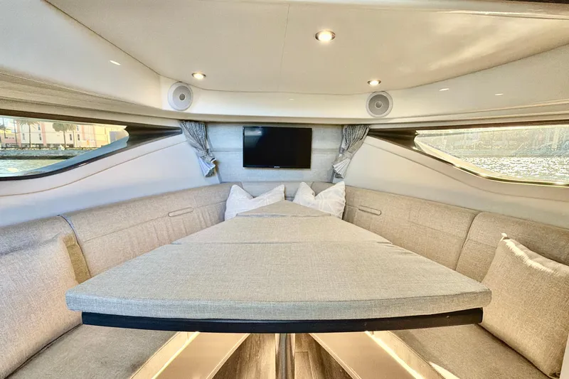  Yacht Photos Pics Luxurious interior of 2022 Sea Ray Sundancer 320 yacht with cozy seating and modern amenities.