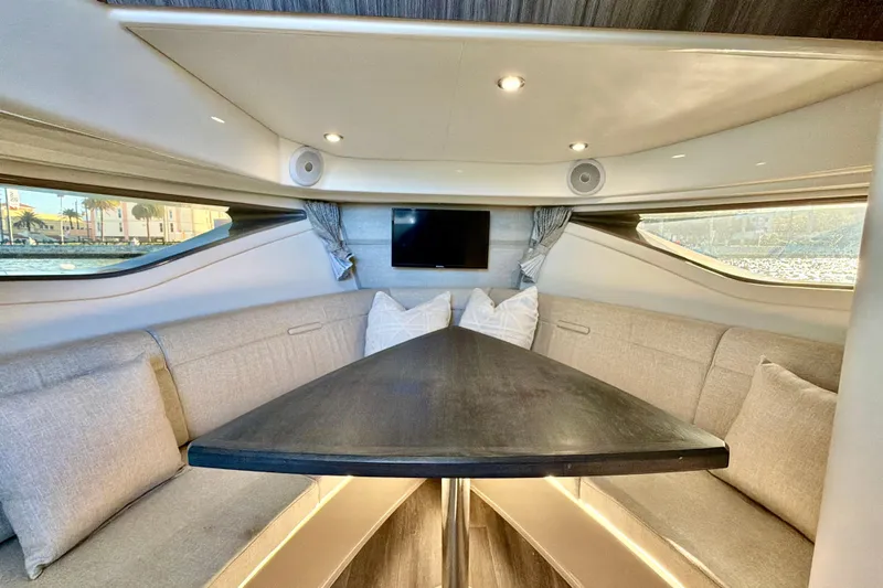  Yacht Photos Pics Luxurious interior of 2022 Sea Ray Sundancer 320 yacht with elegant seating and modern amenities.