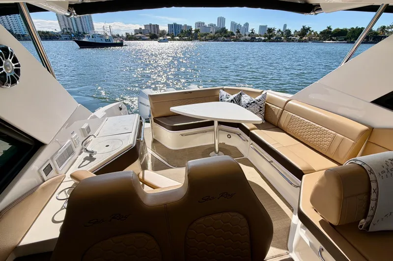  Yacht Photos Pics Luxurious 2022 Sea Ray Sundancer 320 yacht interior with waterfront view.