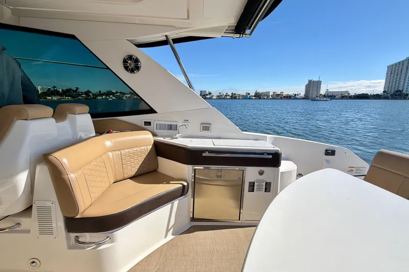  Yacht Photos Pics Interior of 2022 Sea Ray Sundancer 320 yacht with seating and water view.