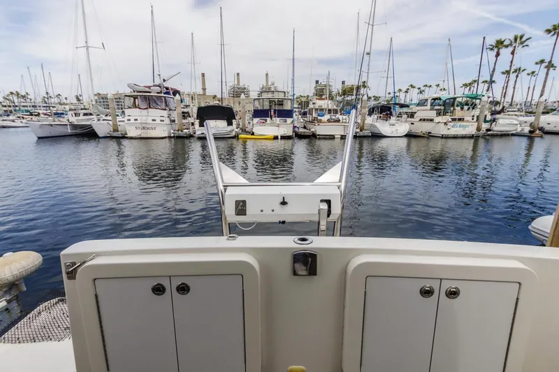 Aloha Ke Akua Yacht Photos Pics 2007 Carver 42 Super Sport yacht docked in a marina with other boats.