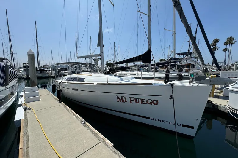 Mi Fuego Yacht Photos Pics 2017 Beneteau Oceanis 37 sailboat docked in marina, named "Mi Fuego".