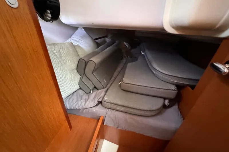 Mi Fuego Yacht Photos Pics Cabin interior of 2017 Beneteau Oceanis 37 with cushions and bedding.