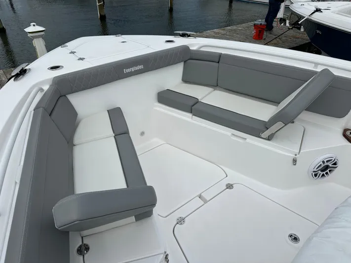  Yacht Photos Pics 2023 Everglades 395 Center Console boat with spacious seating area and modern design.