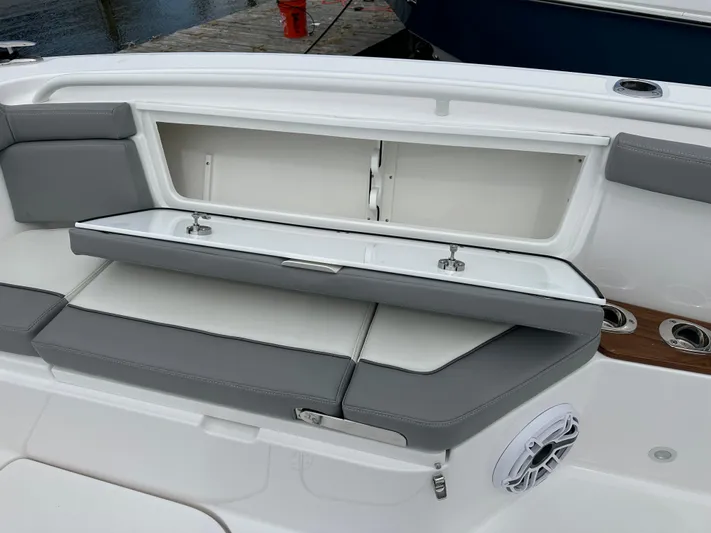  Yacht Photos Pics 2023 Everglades 395 Center Console seating and storage compartment.