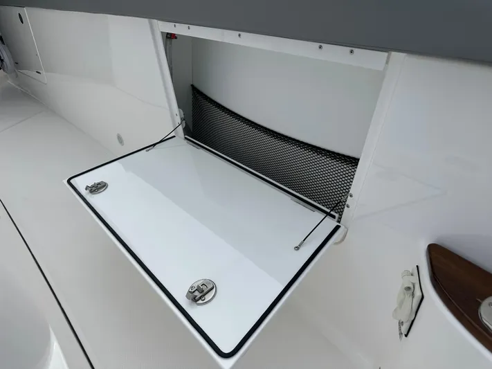  Yacht Photos Pics Storage compartment on 2023 Everglades 395 Center Console boat.