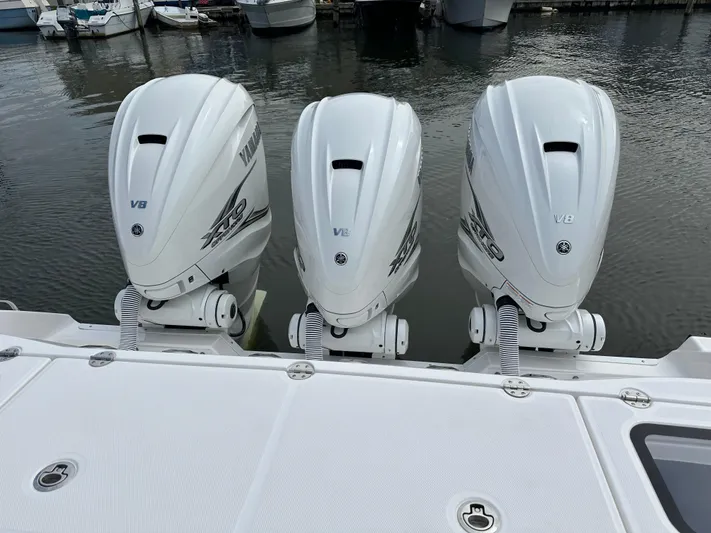  Yacht Photos Pics Triple Yamaha V8 outboard engines on a 2023 Everglades 395 Center Console boat.