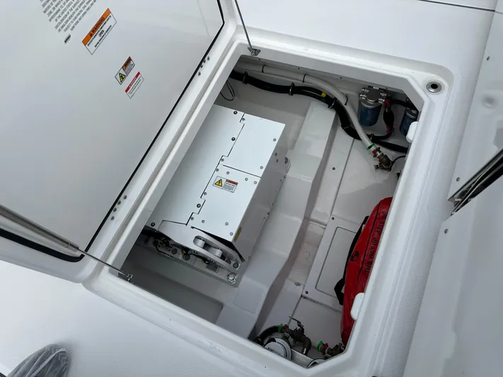  Yacht Photos Pics 2023 Everglades 395 Center Console engine compartment with equipment and wiring.