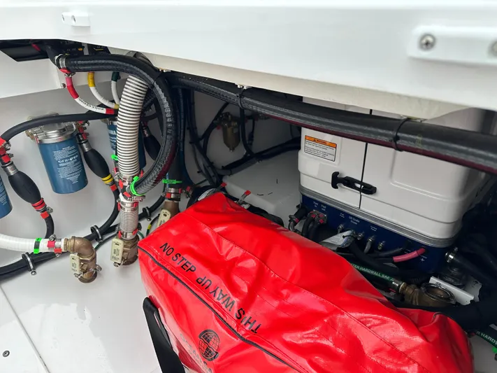  Yacht Photos Pics 2023 Everglades 395 Center Console engine compartment with wiring and components.