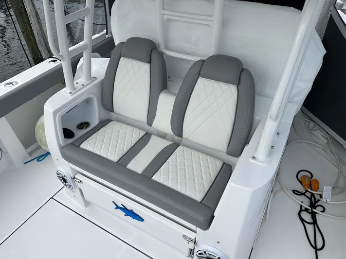  Yacht Photos Pics 2023 Everglades 395 Center Console boat with dual cushioned seats.