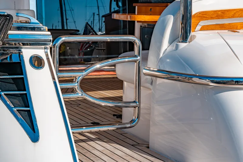 Yacht Photos Pics Luxury yacht deck with polished metal railings, Belize 54 Daybridge, 2015 model.