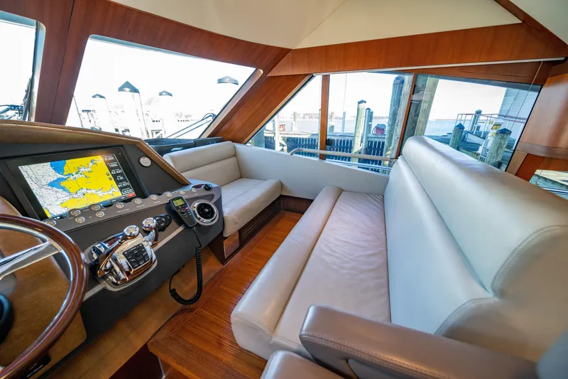  Yacht Photos Pics Interior of 2015 Belize 54 Daybridge yacht with navigation system and plush seating.