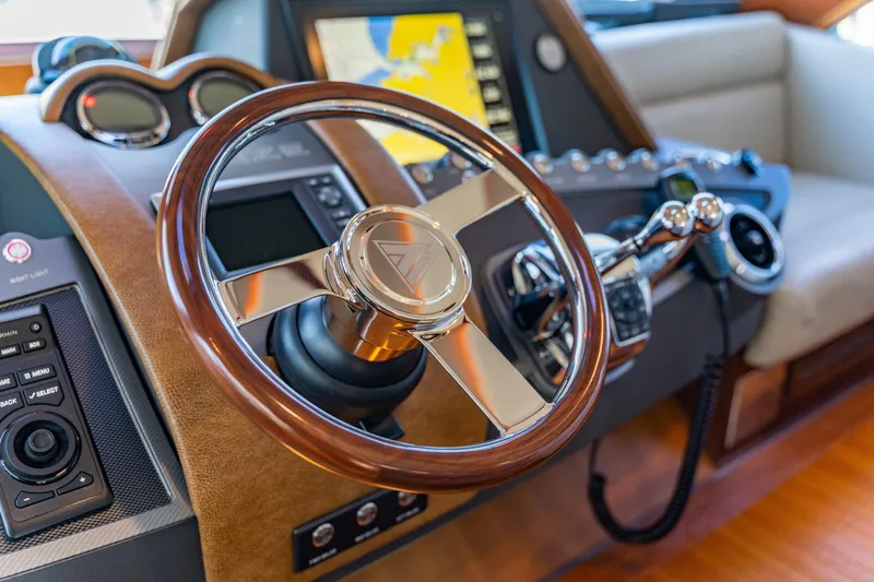  Yacht Photos Pics Steering wheel and controls of a 2015 Belize 54 Daybridge yacht.