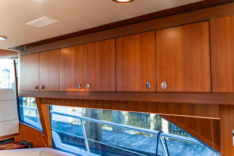  Yacht Photos Pics Luxurious wooden cabinetry inside a 2015 Belize 54 Daybridge yacht.