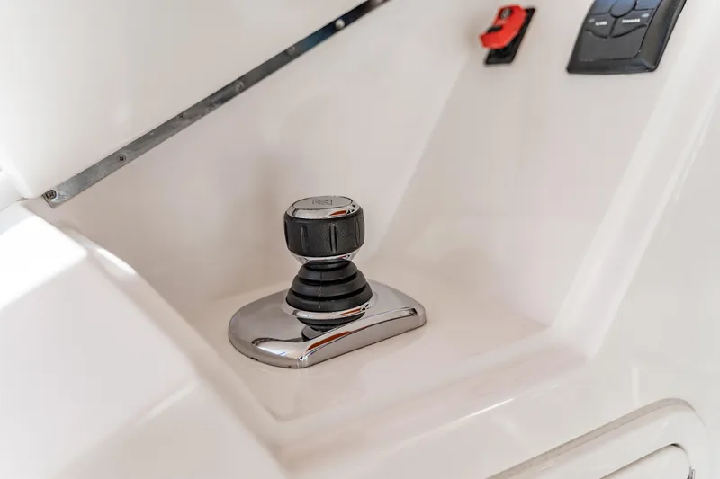  Yacht Photos Pics Control panel of a 2015 Belize 54 Daybridge yacht, featuring a joystick and switches.