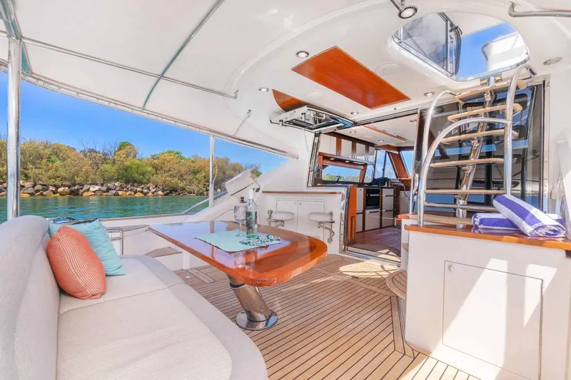  Yacht Photos Pics Luxurious 2015 Belize 54 Daybridge yacht interior with elegant seating and dining area.