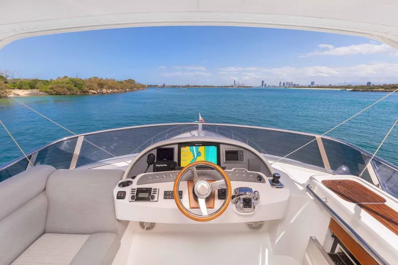  Yacht Photos Pics Helm of 2015 Belize 54 Daybridge yacht with ocean view and city skyline.